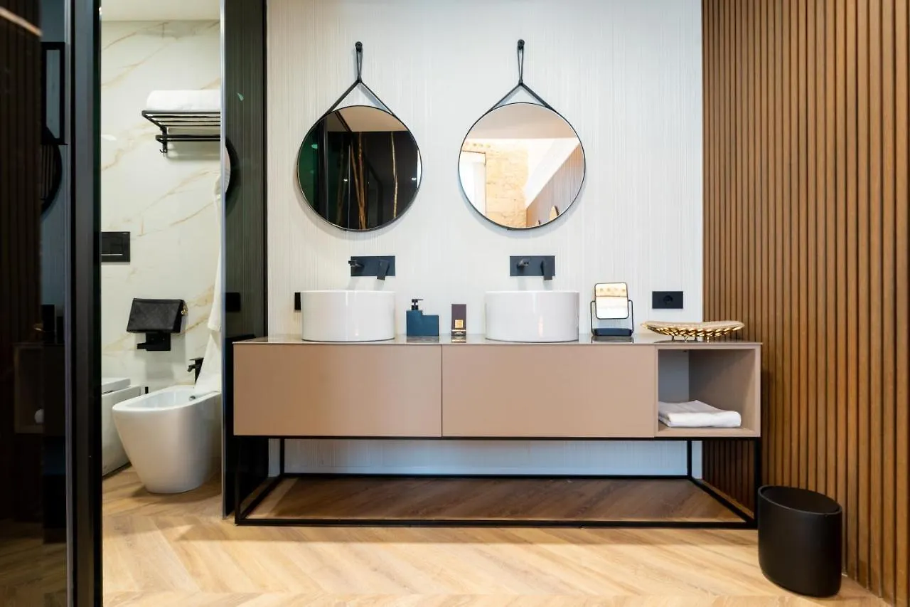 Nero Luxury Suites Cagliari 0*,  Włochy